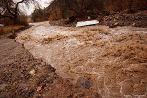 Trent Nelson  |  The Salt Lake Tribune A road washed out by Beaver Dam Wash in Motoqua, Utah, Wednesday, December 22, 2010.
