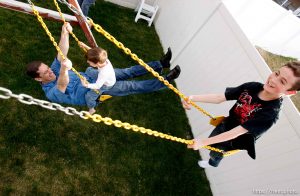 Trent Nelson  |  The Salt Lake Tribune
New Utah State Senator Aaron Osmond at play in the family's backyard in South Jordan, Utah, Friday, May 6, 2011. On his lap is his son Jackson and another son, Ryan is at right.