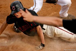 Trent Nelson  |  The Salt Lake Tribune
American Fork's Zac Haws dives dives safely into third as Lone Peak hosts American Fork High School baseball in Highland, Utah, Friday, May 6, 2011.