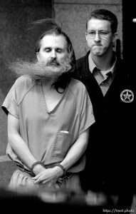 Brian David Mitchell is escorted out of court after being sentenced to life in prison for his role in the kidnapping of Elizabeth Smart, in Salt Lake City, Utah, Wednesday, May 25, 2011.