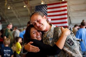 Trent Nelson  |  The Salt Lake Tribune Spc Lisa Bradford, right, embraces Sgt Fresia Alder as the Utah National Guard's 141st Military Intelligence Battalion returned to Salt Lake City, Utah, from duty in Iraq Wednesday, June 15, 2011. The two served together in Iraq. Some 275 soldiers of the 141st deployed in June last year.