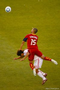 Trent Nelson  |  The Salt Lake Tribune Real Salt Lake's Alvaro Saborio leaps over New York's Mehdi Ballouchy. Real Salt Lake vs. New York Red Bulls at Rio Tinto Stadium in Sandy, Utah. Saturday, August 6, 2011.