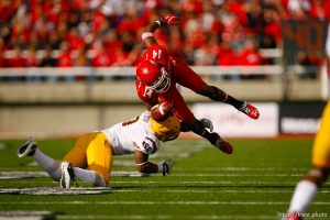 Trent Nelson  |  The Salt Lake Tribune Utah receiver Reggie Dunn fumbles the ball as he's hit by Arizona State safety Clint Floyd in the second half, Utah vs. Arizona State, college football at Rice-Eccles Stadium in Salt Lake City, Utah, Saturday, October 8, 2011.