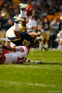 Trent Nelson  |  The Salt Lake Tribune Pitt's K'Waun Williams tackles Utah's John White during the second half. Utah vs. Pitt, college football at Heinz Field Stadium in Pittsburgh, Pennsylvania, Saturday, October 15, 2011.