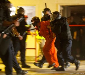 Trent Nelson  |  The Salt Lake Tribune An emergency response team from the Montgomery County (PA) Correctional Facility subdues a volunteer role playing as an inmate during a training scenario at the Mock Prison Riot, Monday, May 7, 2012 at the West Virginia Penitentiary in Moundsville, West Virginia.