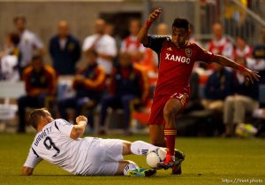 Trent Nelson  |  The Salt Lake Tribune RSL's Paulo Junior dribbles with LA's Chad Barrett defending as Real Salt Lake hosts the L.A. Galaxy, MLS Soccer at Rio Tinto Stadium Wednesday, June 20, 2012 in Salt Lake City, Utah.