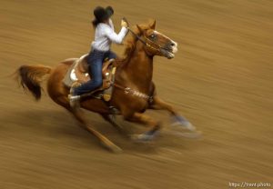 Trent Nelson  |  The Salt Lake Tribune
Reagan Dillard competes in the Barrel Racing competition at the Days of '47 Rodeo at the Maverik Center in West Valley City, Utah on Tuesday, July 24, 2012.