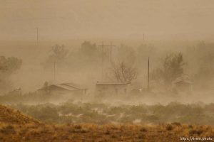 Trent Nelson  |  The Salt Lake City
A dust storm blows through the lonely town of Woodside, Utah on Wednesday, August 1, 2012.