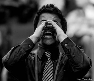 Trent Nelson  |  The Salt Lake Tribune A man yells, 