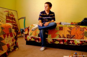 Trent Nelson  |  The Salt Lake Tribune Michael Chambers lives his foster mom Patty Jiordano in Eagle Mountain, Utah, Wednesday, September 12, 2012. Due to the lack of services for children with autism, a small number of families are turning their children, like Chambers, over to the child welfare system each year desperate for the services they can get in state custody.