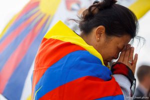 Trent Nelson  |  The Salt Lake Tribune
Tsering Chadon cries during a prayer as approximately sixty people turned out to show their support for human rights inTibet Wednesday October 24, 2012 at the state capitol in Salt Lake City, Utah. The rally was part of the Flame of Truth Relay, a worldwide torch relay to highlight dozens of Tibetan self-immolations since 2009 and promote a response from the United Nations.