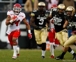 Trent Nelson  |  The Salt Lake Tribune Utah Utes wide receiver Reggie Dunn (14) returns a kick for a touchdown in the fourth quarter as the Colorado Buffaloes host the University of Utah Utes, college football Friday November 23, 2012 in Boulder.