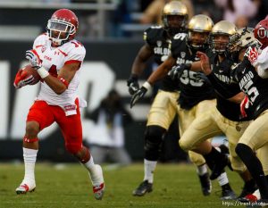 Trent Nelson  |  The Salt Lake Tribune Utah Utes wide receiver Reggie Dunn (14) returns a kick for a touchdown in the fourth quarter as the Colorado Buffaloes host the University of Utah Utes, college football Friday November 23, 2012 in Boulder.