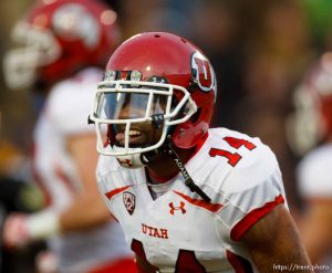 Trent Nelson  |  The Salt Lake Tribune Utah Utes wide receiver Reggie Dunn (14) celebrates his touchdown in the fourth quarter as the Colorado Buffaloes host the University of Utah Utes, college football Friday November 23, 2012 in Boulder.
