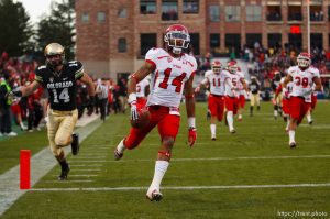 Trent Nelson  |  The Salt Lake Tribune Utah Utes wide receiver Reggie Dunn (14) returns a kick for a touchdown in the fourth quarter as the Colorado Buffaloes host the University of Utah Utes, college football Friday November 23, 2012 in Boulder.