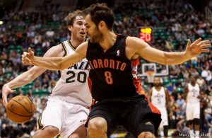 Trent Nelson  |  The Salt Lake Tribune Utah Jazz shooting guard Gordon Hayward (20) drives with Toronto Raptors point guard Jose Calderon (8) defending as the Utah Jazz face the Toronto Raptors Friday December 7, 2012.