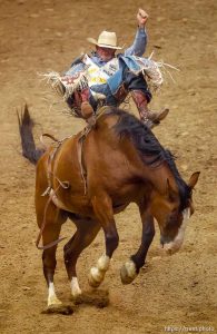 Trent Nelson  |  The Salt Lake Tribune Kaycee Feild competing in Championship Bareback Riding at the Days of '47 Rodeo at EnergySolutions Arena in Salt Lake City Saturday July 20, 2013.