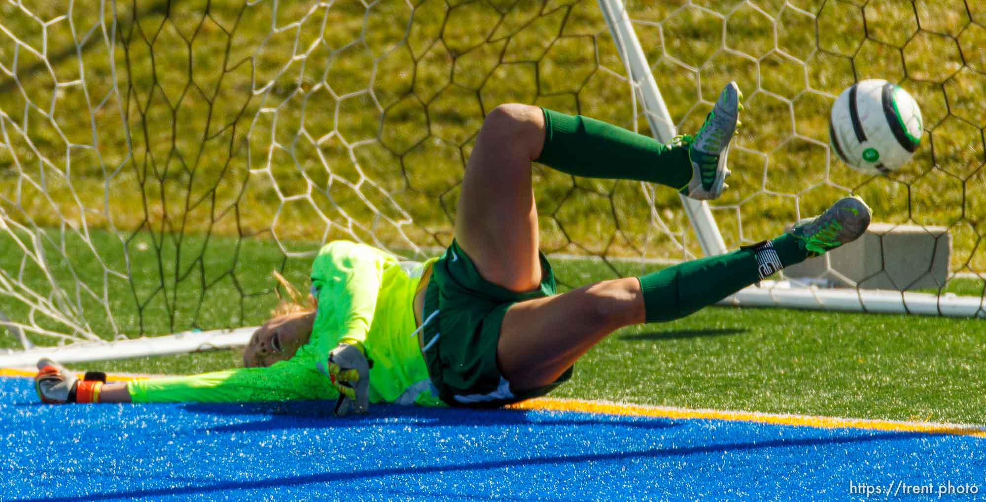Trent Nelson  |  The Salt Lake Tribune Juan Diego scores on a penalty kick by Emily Pascua as Snow Canyon's Grace Walton tries to make the save. Juan Diego High School hosts Snow Canyon in a 3A girls' soccer state quarterfinal match in Draper, Saturday October 19, 2013.