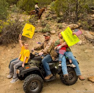 Trent Nelson  |  The Salt Lake Tribune
Under the eyes of a mounted Kane County Sheriff's Deputy, motorized vehicles make their way through Recapture Canyon, which has been closed to motorized use since 2007, after a call to action by San Juan County Commissioner Phil Lyman. Saturday May 10, 2014 north of Blanding.