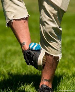 Trent Nelson  |  The Salt Lake Tribune Reggae fans play hackey sack at the Reggae Rise Up Festival in Liberty Park, Salt Lake City, Saturday July 12, 2014. The festival is in its fifth year and expects to draw close to 17,000 people over two days. Saturday night features Matisyahu and The Expandables. The festival continues Sunday with a lineup that includes Slightly Stoopid and Stephen Ragga Marley.