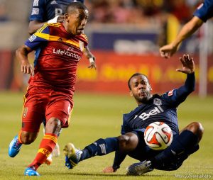 Trent Nelson  |  The Salt Lake Tribune Real Salt Lake's Joao Plata (8) loses the ball to Vancouver's Carlyle Mitchell (24), as Real Salt Lake hosts Vancouver Whitecaps FC at Rio Tinto Stadium in Sandy, Saturday July 19, 2014.