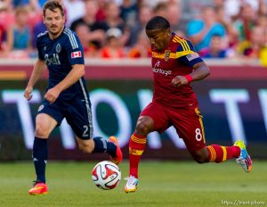 Trent Nelson  |  The Salt Lake Tribune Real Salt Lake's Joao Plata (8) with the ball, Vancouver's Jordan Harvey (2) defending, as Real Salt Lake hosts Vancouver Whitecaps FC at Rio Tinto Stadium in Sandy, Saturday July 19, 2014.