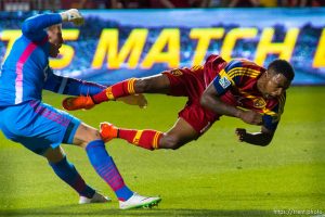 Trent Nelson  |  The Salt Lake Tribune Real Salt Lake's Robbie Findley (10) collides with Vancouver's David Ousted (1) as Real Salt Lake hosts Vancouver Whitecaps FC at Rio Tinto Stadium in Sandy, Saturday July 19, 2014.
