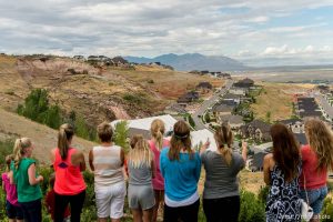Trent Nelson  |  The Salt Lake Tribune Onlookers take in the scene of a large mudslide in North Salt Lake that destroyed one home and caused the evacuation of dozens more, Tuesday August 5, 2014.