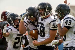 Trent Nelson  |  The Salt Lake Tribune Duchesne's Jacob Plummer (58) celebrates a turnover as Layton Christian hosts Duchesne, high school football in Layton Thursday August 21, 2014.