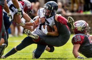 Trent Nelson  |  The Salt Lake Tribune Duchesne's Daniel Hanberg is stopped as Layton Christian hosts Duchesne, high school football in Layton Thursday August 21, 2014.