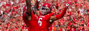 Trent Nelson  |  The Salt Lake Tribune
Utah Utes wide receiver Dres Anderson (6) celebrates a touchdown with teammate Kenneth Scott, left, as Utah hosts Fresno State, college football at Rice-Eccles Stadium Saturday September 6, 2014.