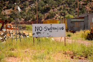 Trent Nelson  |  The Salt Lake Tribune no swimming sign in Hildale, Thursday September 25, 2014.