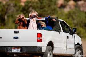 Trent Nelson  |  The Salt Lake Tribune girls in back of truck in Hildale, Thursday September 25, 2014.