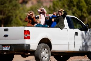 Trent Nelson  |  The Salt Lake Tribune girls in back of truck in Hildale, Thursday September 25, 2014.