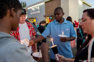 Trent Nelson  |  The Salt Lake Tribune Candles are lit at a candlelight vigil Sunday September 14, 2014 for Darrien Hunt, who was shot and killed by Saratoga Springs police.
