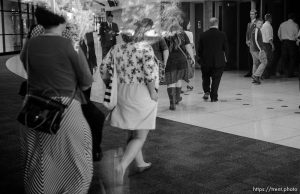 Trent Nelson  |  The Salt Lake Tribune Women enter BYU's Marriott Center for a broadcast of the LDS General Priesthood Session in Provo Saturday October 4, 2014. The event was one of several planned by Ordain Women.