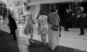 Trent Nelson  |  The Salt Lake Tribune Women enter BYU's Marriott Center for a broadcast of the LDS General Priesthood Session in Provo Saturday October 4, 2014. The event was one of several planned by Ordain Women.