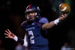 Trent Nelson  |  The Salt Lake Tribune Woods Cross quarterback Tanner Hammond throws the ball as Woods Cross hosts Corner Canyon High School football, in Woods Cross, Wednesday October 15, 2014.