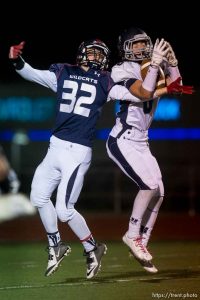 Trent Nelson  |  The Salt Lake Tribune Corner Canyon's Jake Cahoon makes a pick ahead of Woods Cross's James Gilbert as Woods Cross hosts Corner Canyon High School football, in Woods Cross, Wednesday October 15, 2014.