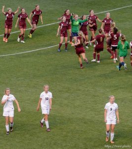 Trent Nelson  |  The Salt Lake Tribune Cedar City players, top, celebrate after beating Desert Hills in the 3A girls' high school soccer state championship game at Rio Tinto Stadium in Sandy, Saturday October 25, 2014.