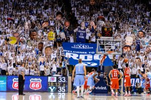 Trent Nelson  |  The Salt Lake Tribune BYU fans try to distract Utah Utes guard Delon Wright (55) on the free throw line, as BYU hosts Utah, college basketball at the Marriott Center in Provo, Wednesday December 10, 2014.