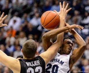 Trent Nelson  |  The Salt Lake Tribune Gonzaga Bulldogs forward Kyle Wiltjer (33) knocks the ball away from Brigham Young Cougars guard Anson Winder (20) as BYU hosts Gonzaga, men's college basketball at the Marriott Center in Provo, Saturday December 27, 2014.