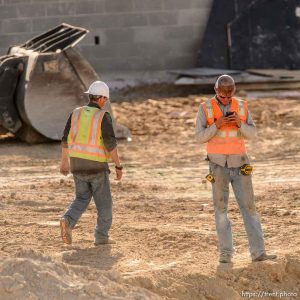 Trent Nelson  |  The Salt Lake Tribune Workers from Phaze Concrete on the construction site of the new Rawlins High School in Rawlins, Wyoming, Tuesday June 30, 2015.