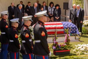 Trent Nelson  |  The Salt Lake Tribune
Ted Perry, right, performs the dedication of the grave at the graveside service for his brother, the late LDS apostle L. Tom Perry,  Friday June 5, 2015 at the Salt Lake City Cemetery. At left is Elder Russell M. Nelson.