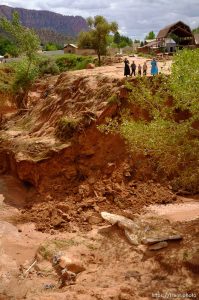 Trent Nelson  |  The Salt Lake Tribune People take in the scene in a Hildale wash where a flash flood killed nine people (with four still missing) Tuesday September 15, 2015., the day after an SUV and a van were washed off a road during a flash flood in this polygamous Utah-Arizona border community.