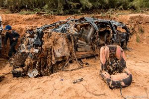 Trent Nelson  |  The Salt Lake Tribune A car seat on the ground at the spot in a Hildale wash Tuesday September 15, 2015 where two vehicles ended up after being washed away in a flash flood. Nine people died (with four still missing) when the SUV and van were washed off a road during a flash flood in this polygamous Utah-Arizona border community.