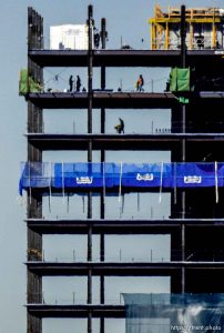 Trent Nelson  |  The Salt Lake Tribune Workers on the job building 111 Main, a new high-rise in Salt Lake City, Tuesday September 22, 2015.