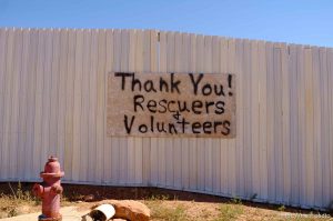 Trent Nelson  |  The Salt Lake Tribune sign: thank you rescuers and volunteers on wall, Friday September 25, 2015.