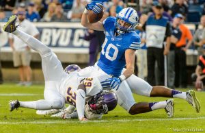 Trent Nelson  |  The Salt Lake Tribune Brigham Young Cougars wide receiver Mitch Mathews (10) stretches the ball into the end zone for a touchdown as BYU hosts East Carolina, college football at LaVell Edwards Stadium in Provo, Saturday October 10, 2015.