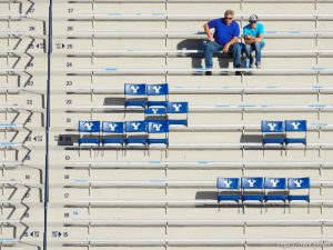 Trent Nelson  |  The Salt Lake Tribune Early-arriving fans waiting for the game to start as BYU hosts East Carolina, college football at LaVell Edwards Stadium in Provo, Saturday October 10, 2015.